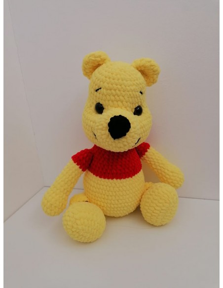 A winnie the pooh look alike toy for children