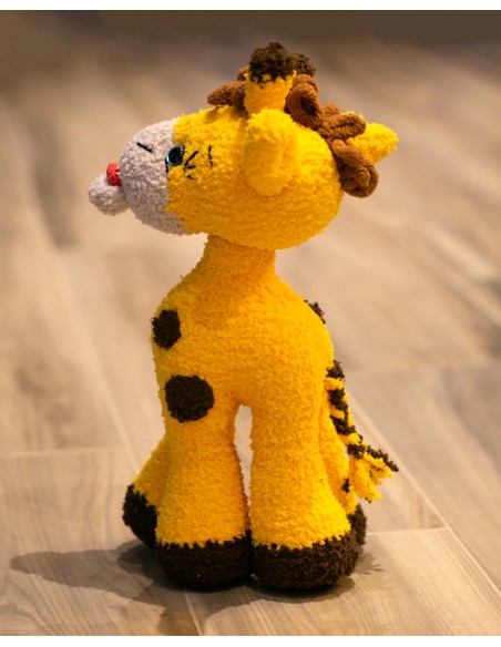 A yellow giraffe toy suitable for babies, kids, children and toddlers. Very soft and squishy. Touch and hold for cuddles